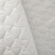 Tissu Laurette Doublure Matelassé Piquage Vagues Blanc